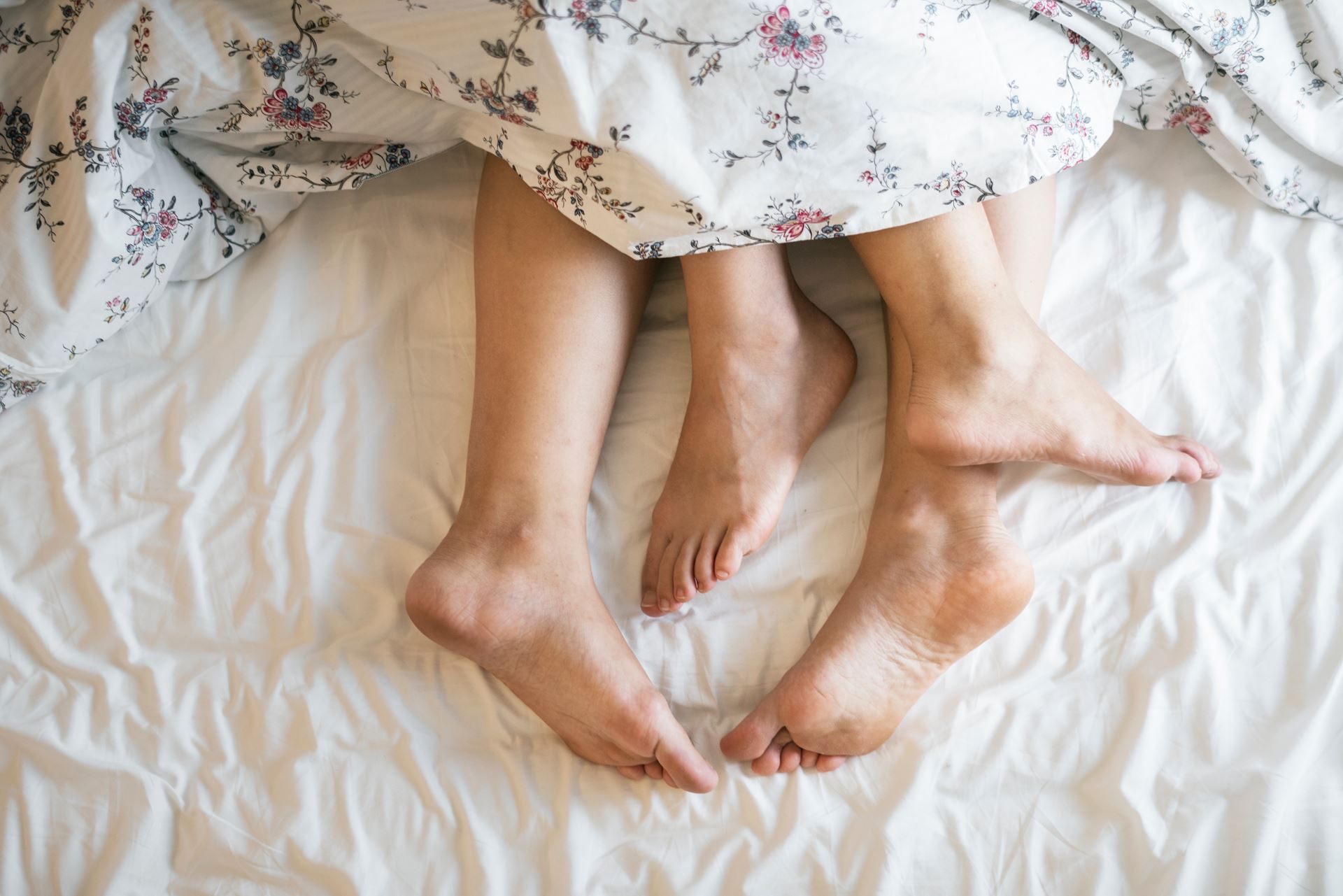 a person sitting on a bed